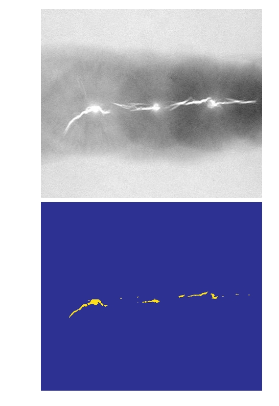 Monochrome X-ray image of a weld. (b) Result of color coding. (Original image courtesy of X-TEK Systems, Ltd.)